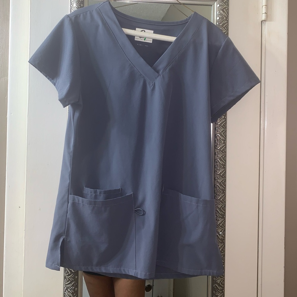 Gray colored scrub top.